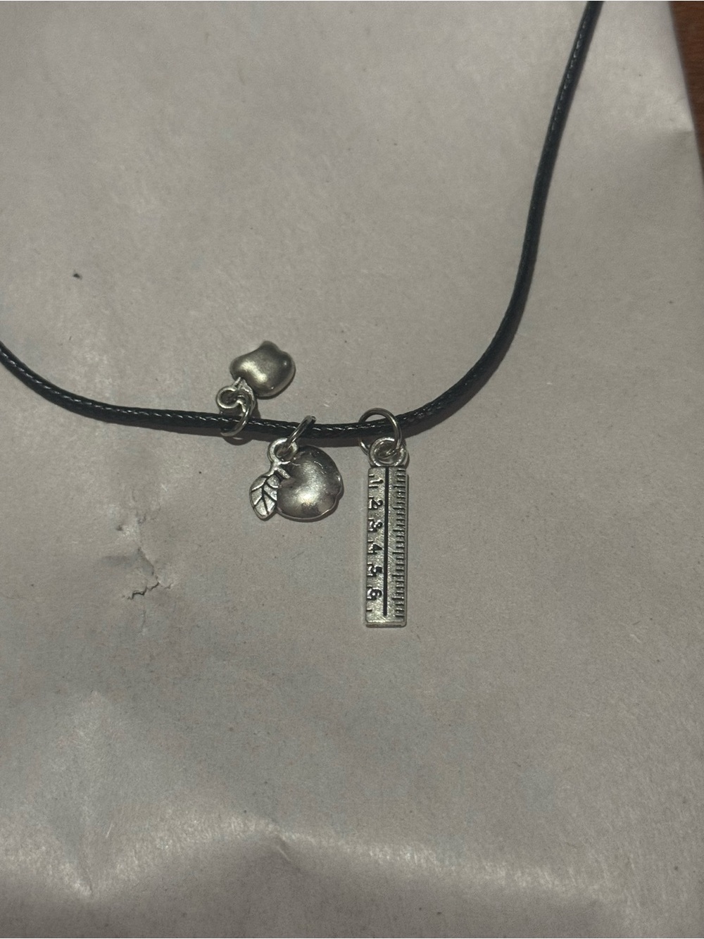 Silver Apple & Ruler Charm Necklace on Black Cord